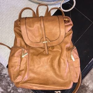 Light brown leather backpack with gold accents!!